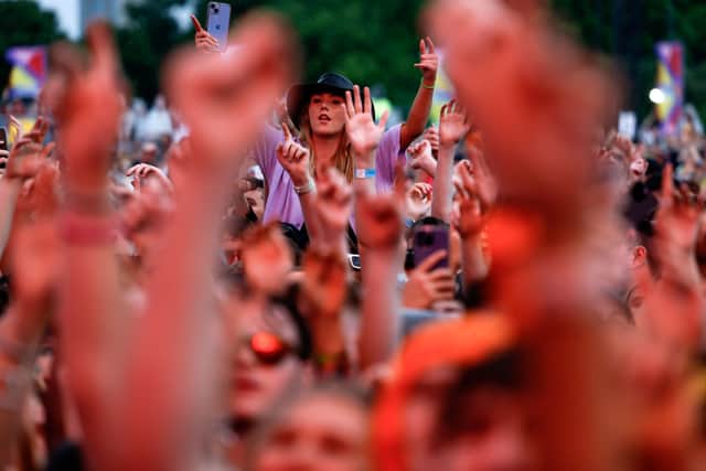 Music fans watch Kasabian at TRNSMT Festival 2023.