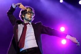 Singer Jarvis Cocker of Pulp performs onstage during day 1 of the 2012 Coachella Valley Music & Arts Festival at the Empire Polo Field on April 13, 2012 in Indio, California.  (Photo by Kevin Winter/Getty Images for Coachella)