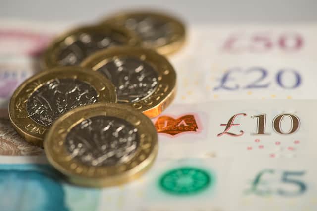 Wages in the UK are rising at a record pace but are still failing to keep up with sky-high inflation, new figures have revealed. Credit: PA
