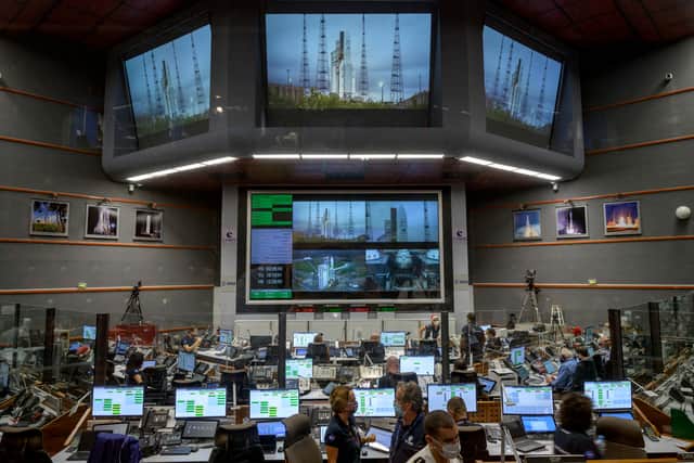 Launch teams monitor the countdown to the launch of Arianespace's Ariane 5 rocket carrying NASAs James Webb Space Telescope on December 25, 2021, in the Jupiter Center at the Guiana Space Center in Kourou, French Guiana. (Photo by Bill Ingalls/NASA via Getty Images)