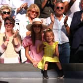 LONDON, ENGLAND - JULY 10: Jelena Djokovic, wife of Novak Djokovic of Serbia and their daughter Tara react in the stands following their victory against Nick Kyrgios of Australia during their Men's Singles Final match on day fourteen of The Championships Wimbledon 2022 at All England Lawn Tennis and Croquet Club on July 10, 2022 in London, England. (Photo by Ryan Pierse/Getty Images)