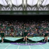 Wimbledon spectators may need to pack a poncho ahead of finals weekend. (Credit: Getty Images)