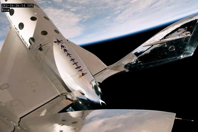 Virgin Galactic's VSS Unity space plane soars high above Earth on its first commercial spaceflight on June 29, 2023. (Image credit: Virgin Galactic)