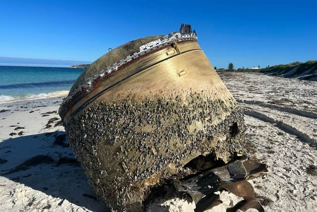 A possible piece of a "foreign space launch vehicle" washed up on an Australian beach. (Image credit: Australian Space Agency)