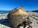 A possible piece of a "foreign space launch vehicle" washed up on an Australian beach. (Image credit: Australian Space Agency)