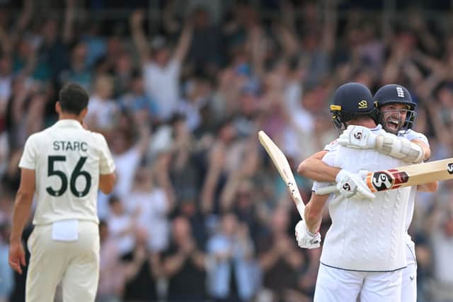 England players Mark Wood (r) and Chris Woakes celebrate victory after day four of the 3rd LV= Ashes Test Match at Headingley on July 09, 2023 in Leeds, England. (Photo by Stu Forster/Getty Images)