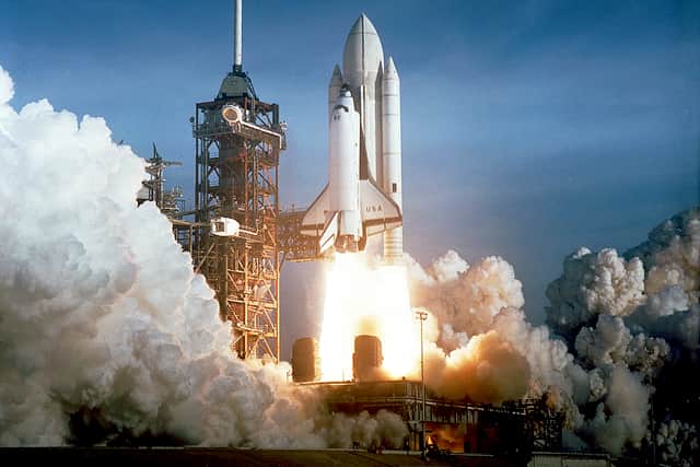 April 12, 1981: NASA photo shows the first launching of the space shuttle from the Kennedy Space Center in Florida. Columbia carried astronauts John Young and Robert Crippen. The space center is 600 miles (965kms) south of Kitty Hawk, North Carolina, where the Wright Brothers first flew under power.  AFP PHOTO/NASA (Photo by NASA / AFP) (Photo by -/NASA/AFP via Getty Images)