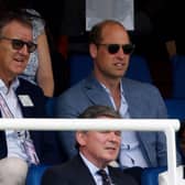 Britain's Prince William, Prince of Wales (C) and his son Britain's Prince George of Wales (R) watch the afternoon session on day four of the second Ashes cricket Test match between England and Australia at Lord's cricket ground in London on July 1, 2023. (Photo by Ian Kington / AFP) / RESTRICTED TO EDITORIAL USE. NO ASSOCIATION WITH DIRECT COMPETITOR OF SPONSOR, PARTNER, OR SUPPLIER OF THE ECB (Photo by IAN KINGTON/AFP via Getty Images)