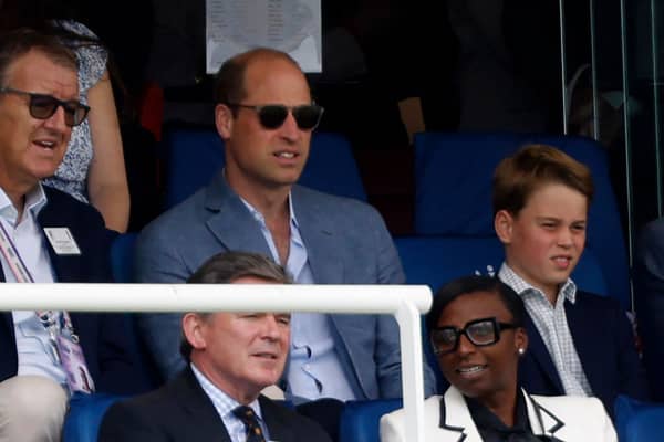 Britain's Prince William, Prince of Wales (C) and his son Britain's Prince George of Wales (R) watch the afternoon session on day four of the second Ashes cricket Test match between England and Australia at Lord's cricket ground in London on July 1, 2023. (Photo by Ian Kington / AFP) / RESTRICTED TO EDITORIAL USE. NO ASSOCIATION WITH DIRECT COMPETITOR OF SPONSOR, PARTNER, OR SUPPLIER OF THE ECB (Photo by IAN KINGTON/AFP via Getty Images)