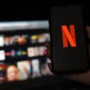 Netflix has changed its pricing structure with UK members now only able to have an ad-free viewing experience for a minimum of £10.99 per month. (Credit: Getty Images)