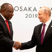 Vladimir Putin and south African president Cyril Ramaphosa were due to reunite at a summit in Johannesburg next month, but the Russian leader has pulled out over fears he could be arrested. (Credit: AFP via Getty images) 