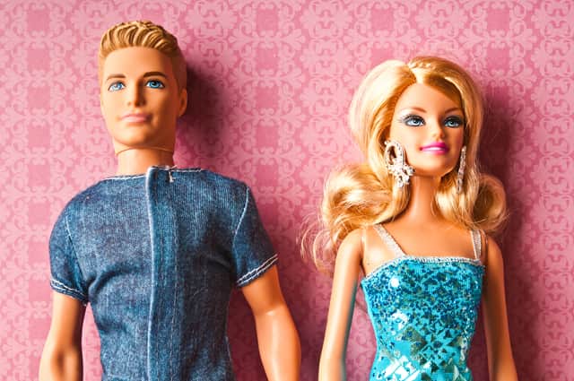 Free Barbie and Ken dolls have been given to primary school pupils across the UK, but experts are unsure of the benefits.
