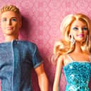 Free Barbie and Ken dolls have been given to primary school pupils across the UK, but experts are unsure of the benefits.