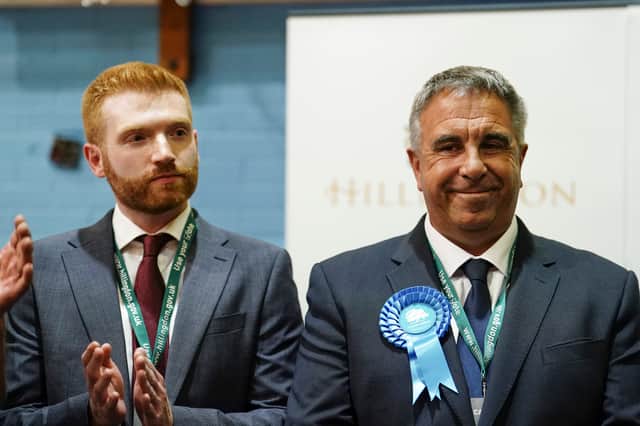 Conservative MP Steve Tuckwell (right) in Queensmead Sports Centre in South Ruislip, west London, is announced as the winner of the Uxbridge and South Ruislip by-election is pictured with Labour candidate Danny Beales. Credit: PA