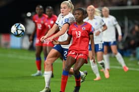 Betina Petit-Frere of Haiti controls the ball against Alessia Russo (Photo by Bradley Kanaris/Getty Images)