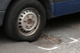 The number of vehicles reported to have been damaged by potholes in the UK has hit a five-year high, according to motoring group RAC. (Credit: Yui Mok/PA Wire)