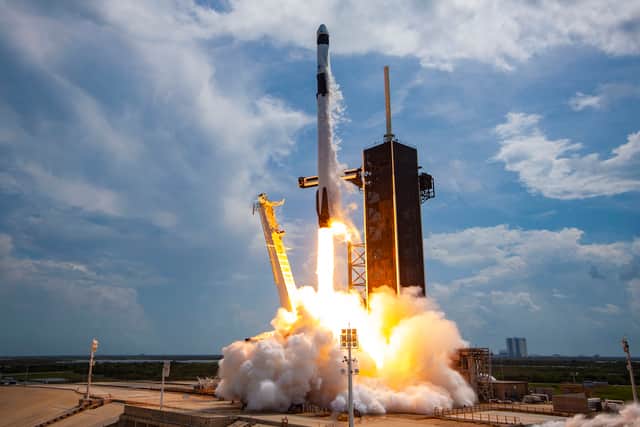 A Falcon 9 rocket carrying the company's Crew Dragon spacecraft launches on the Demo-2 mission to the International Space Station with NASA astronauts Robert Behnken and Douglas Hurley onboard at Launch Complex 39A May 30, 2020, at the Kennedy Space Center, Florida. (Photo by SpaceX via Getty Images)