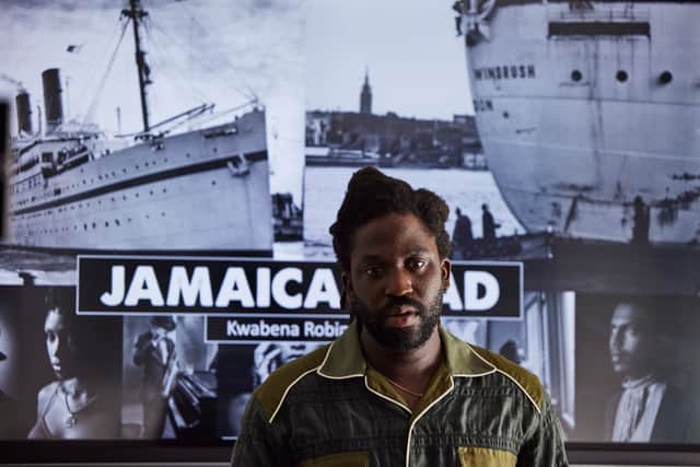 Adjani Salmon as Kwabena in Dreaming Whilst Black, giving a presentation about his film Jamaica Road (Credit: BBC/Big Deal Films/Domizia Salusest)