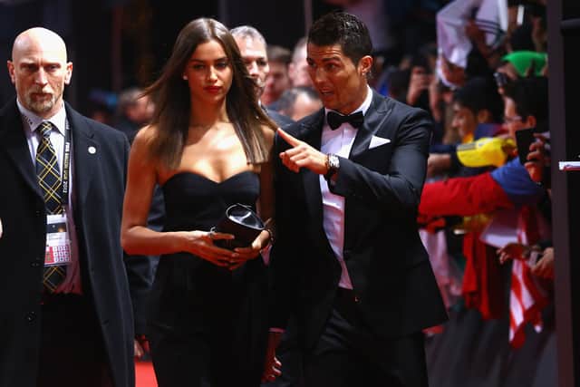 ZURICH, SWITZERLAND - JANUARY 07:  (L-R) Irina Shayk and Cristiano Ronaldo of Real Madrid pose during the red carpet arrivals for the FIFA Ballon dâOr Gala 2012 on January 7, 2013 at Congress House in Zurich, Switzerland.  (Photo by Christof Koepsel/Getty Images)