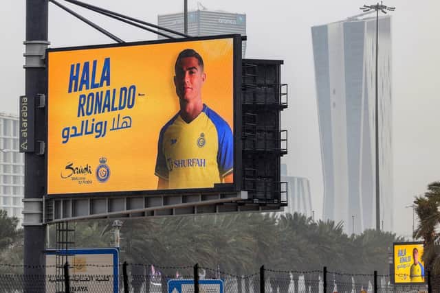 A billboard welcoming Saudi football club al-Nassr's new Portuguese forward Cristiano Ronaldo (Photo by FAYEZ NURELDINE/AFP via Getty Images)