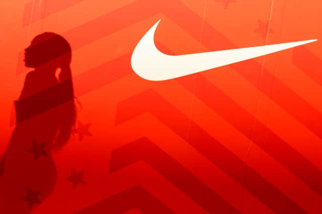 The shadow of Allyson Felix is seen next to a Nike logo after finishing second place in the Women's 400m Final on day three of the 2020 U.S. Olympic Track & Field Team Trials at Hayward Field on June 20, 2021 in Eugene, Oregon. (Photo by Patrick Smith/Getty Images)