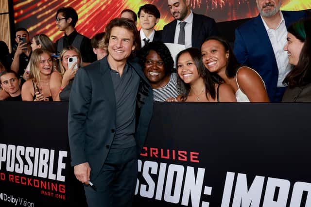 Tom Cruise poses with fans during the US Premiere of "Mission: Impossible - Dead Reckoning Part One" presented by Paramount Pictures and Skydance at Rose Theater, Jazz at Lincoln Center on July 10, 2023, in New York, New York. (Photo by Jason Mendez/Getty Images for Paramount Pictures)