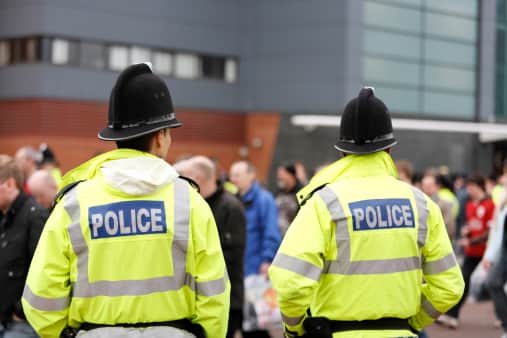 Two police officers were injured in a knife attack in Manchester. 