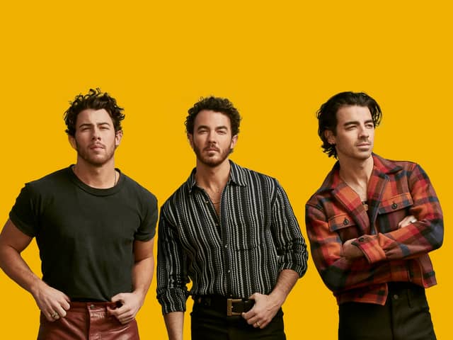The Jonas Brothers have announced a rescheduling of their European tour dates, including the United Kingdom, due to “exciting projects” they are currently involved with (Credit: Live Nation)