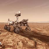  In this concept illustration provided by NASA, NASA's Perseverance (Mars 2020) rover will store rock and soil samples in sealed tubes on the planet's surface for future missions to retrieve in the area known as Jezero crater on the planet Mars. (Photo illustration by NASA via Getty Images)