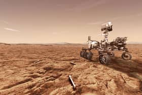  In this concept illustration provided by Nasa, Nasa's Perseverance (Mars 2020) rover will store rock and soil samples in sealed tubes on the planet's surface for future missions to retrieve in the area known as Jezero crater on the planet Mars. (Photo illustration by NASA via Getty Images)