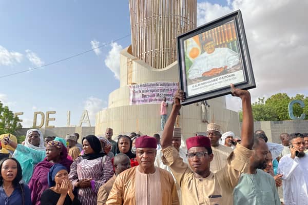 Supporters of Nigerien President Mohamed Bazoum gather to show their support for him in Niamey on July 26, 2023. (Photo by -/AFP via Getty Images)