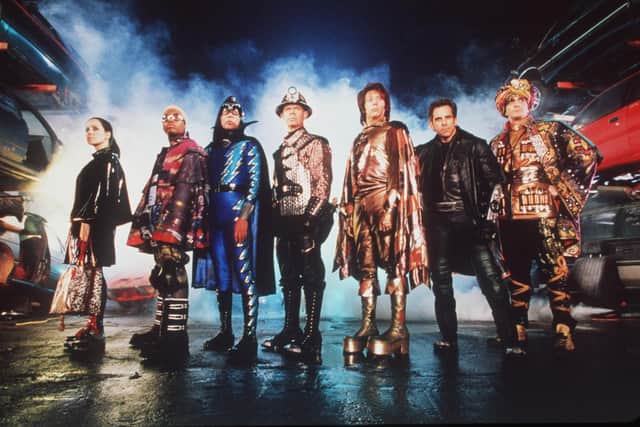 The cast of "Mystery Men." From l-r: Janeane Garofalo (as The Bowler), Kel Mitchell (as Invisible Boy), Wes Studi (as The Sphinx), William H. Macy (as The Shoveler), Paul Reubens (as The Spleen), Ben Stiller (as Mr. Furious) and Hank Azaria (as The Blue Raja). Photo credit: Melinda Sue Gordon 1999 Universal Studios. All Rights Reserved