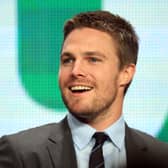 Actor Stephen Amell speaks at the "Arrow" discussion panel during the CW portion of the 2012 Summer Television Critics Association tour at the Beverly Hilton Hotel on July 30, 2012 in Los Angeles, California.  (Photo by Frederick M. Brown/Getty Images)