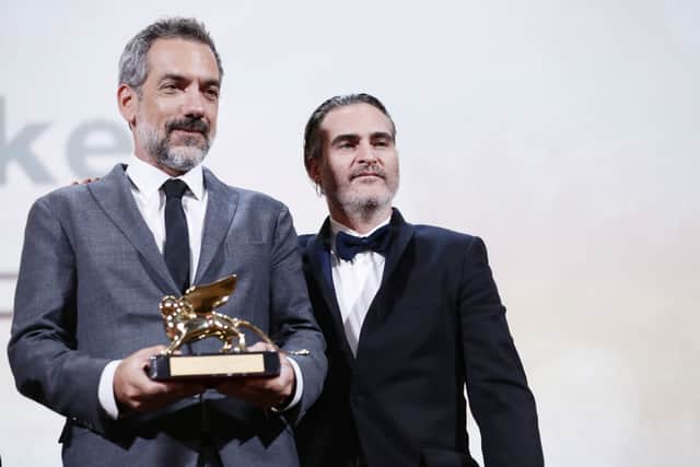 Todd Phillips and Joaquin Phoenix receive the Golden Lion for Best Film Award for âJokerâ during the Award Ceremony during the 76th Venice Film Festival at Sala Grande on September 07, 2019 in Venice, Italy. (Photo by Vittorio Zunino Celotto/Getty Images)