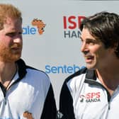 Britain's Prince Harry and St. Regis team captain Argentine Nacho Figueras pose following the charity polo match the Sentebale ISPS Handa Polo Cup at the Roma Polo Club, in Rome on May 24, 2019(Photo by Tiziana FABI / AFP)      
