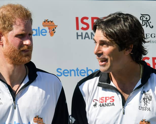 Britain's Prince Harry and St. Regis team captain Argentine Nacho Figueras pose following the charity polo match the Sentebale ISPS Handa Polo Cup at the Roma Polo Club, in Rome on May 24, 2019(Photo by Tiziana FABI / AFP)      