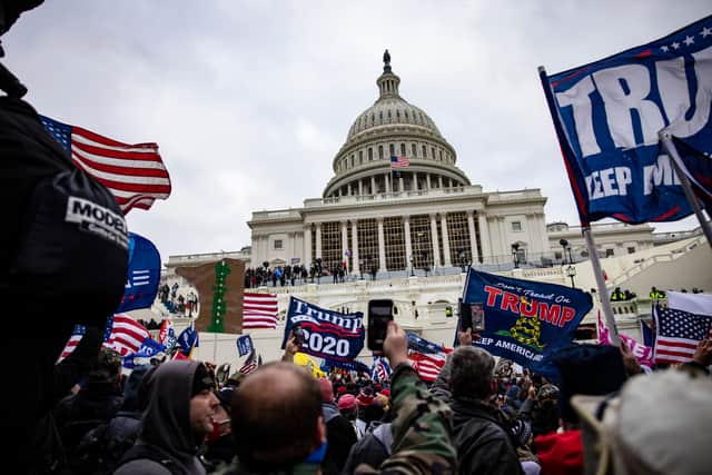 Pro-Trump supporters storm the U.S. Capitol following a rally with President Donald Trump on January 6, 2021 in Washington, DC. Trump supporters gathered in the nation's capital today to protest the ratification of President-elect Joe Biden's Electoral College victory over President Trump in the 2020 election.