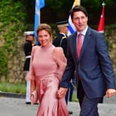 Canada's Prime Minister Justin Trudeau and his wife Sophie Gregoire Trudeau arrive for a Summit of the Americas dinner at the Getty Villa in Pacific Palisades, California, June 9, 2022. (Photo by Frederic J. Brown / AFP) (Photo by FREDERIC J. BROWN/AFP via Getty Images)