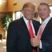 Vince McMahon (L) and Donald Trump attend a press conference about the WWE at the Austin Straubel International Airport on June 22, 2009 in Green Bay, Wisconsin.  (Photo by Mark A. Wallenfang/Getty Images)