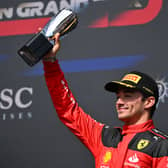 Charles Leclerc celebrates a podium with Ferrari at Belgium Grand Prix