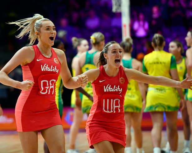 Helen Housby and Natalie Metcalf of England celebrate during the Netball World Cup 2023, Pool F match between Australia and England on 3 August (Photo: Ashley Vlotman/Gallo Images/Netball World Cup 2023 via Getty Images)