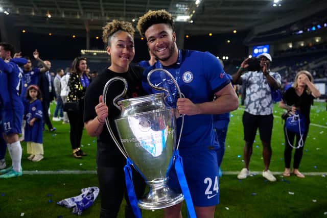 Reece James of Chelsea celebrates with the Champions League Trophy with his Sister, Lauren James following victory in the UEFA Champions League Final between Manchester City and Chelsea FC at Estadio do Dragao on May 29, 2021 in Porto, Portugal. (Photo by Manu Fernandez - Pool/Getty Images)