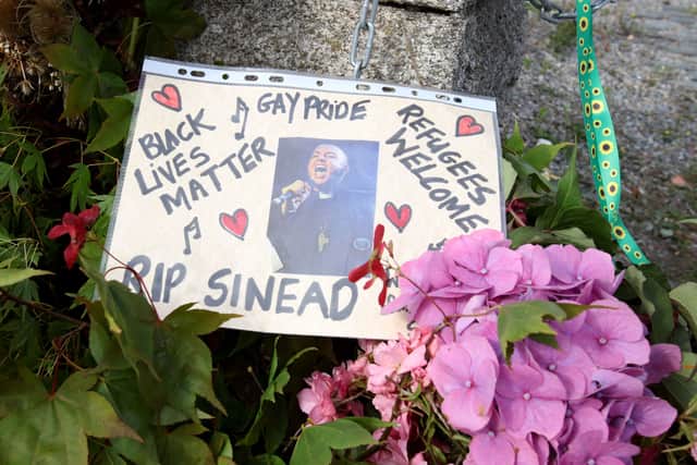 A tribute outside the former home of Sinead O’Connor. (Photo by PAUL FAITH/AFP via Getty Images)