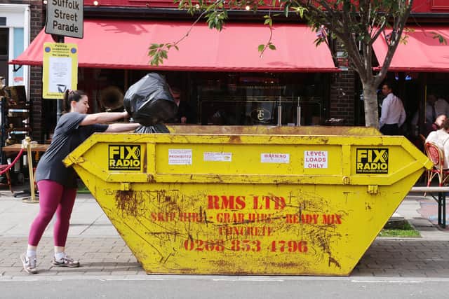 Hundreds of people are tuning in to a live-stream to watch what people fly tip in a central London skip (Photo: SWNS)