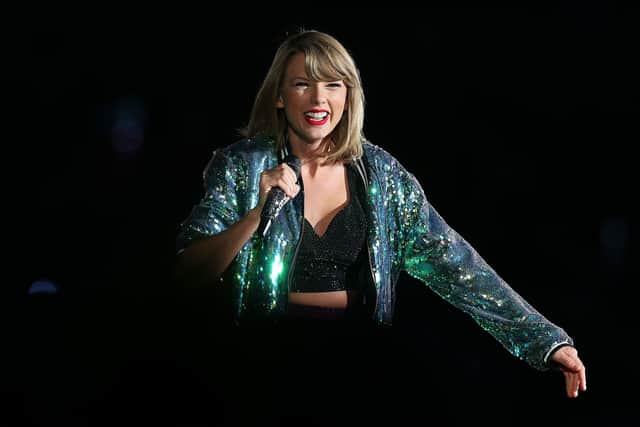 Taylor Swift performing during her 1989 World Tour in 2015 (Photo: Graham Denholm/Getty Images)