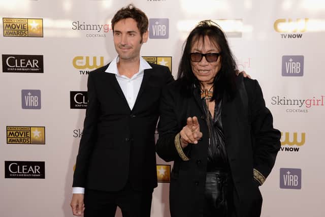Director Malik Bendjelloul (L) and musician Sixto Rodriguez arrive at the 18th Annual Critics' Choice Movie Awards held at Barker Hangar on January 10, 2013 in Santa Monica, California.  (Photo by Jason Merritt/Getty Images)