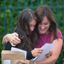 Olivia Katie is congratulated by her mother as she opens her A-level results at Winterbourne International Academy on August 14, 2014 in Bristol, England. Credit: Photo by Matt Cardy/Getty Images