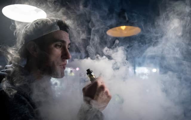 Mitchell Baker who works at the Vapour Place a vaping shop in Bedminster, Bristol