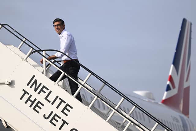Rishi Sunak boards a plane at Stansted Airport as he departs for the AUKUS Meeting in San Diego in March 2023 (Photo: Leon Neal - WPA Pool/Getty Images)