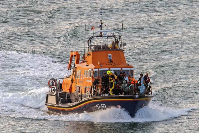 Over 50 people have been rescued after a migrant boat sunk in the Channel on Saturday morning